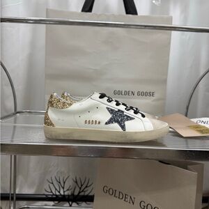 Golden Goose White and Gold Sneakers